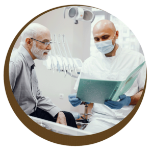 Dentist reviewing records with patient