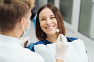 woman smiling at dentist