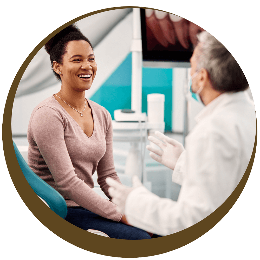 patient talking with dentist