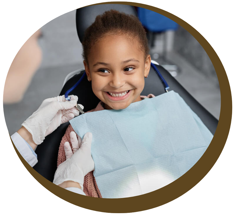 Young black girl smiles during her pediatric dentist in Midlothian experience.